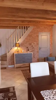 Coin salon dans l'établissement Au Nid Douillet