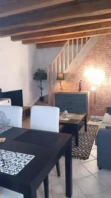Coin salon dans l'établissement Au Nid Douillet