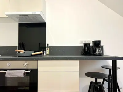 Cuisine ou kitchenette dans l'établissement Le nid Rémois -Pied à terre en champagne
