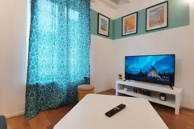 Télévision ou salle de divertissement dans l'établissement Charmant appartement au coeur de Château-Thierry
