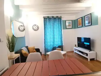 Télévision ou salle de divertissement dans l'établissement Charmant appartement au coeur de Château-Thierry