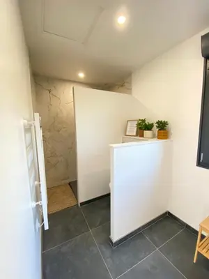 Cuisine ou kitchenette dans l'établissement La Logette