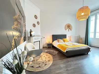 Un ou plusieurs lits dans un hébergement de l'établissement Le cœur de Reims magnifique 3 chambres au centre