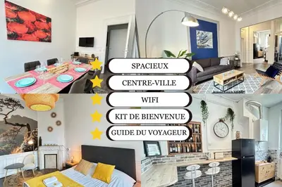 Télévision ou salle de divertissement dans l'établissement Le cœur de Reims magnifique 3 chambres au centre