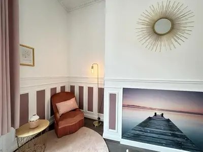 Coin salon dans l'établissement Le cœur de Reims magnifique 3 chambres au centre