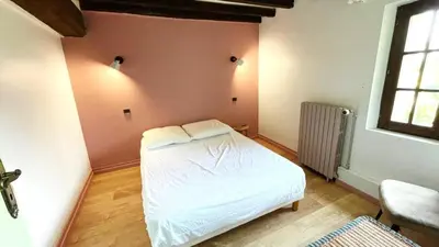 Un ou plusieurs lits dans un hébergement de l'établissement MAISON JV - 24 couchages