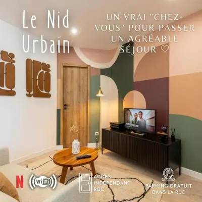 Télévision ou salle de divertissement dans l'établissement Le Nid Urbain - Center - Ground floor