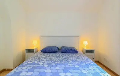 Un ou plusieurs lits dans un hébergement de l'établissement Beautiful Home In Monthenault With Wifi