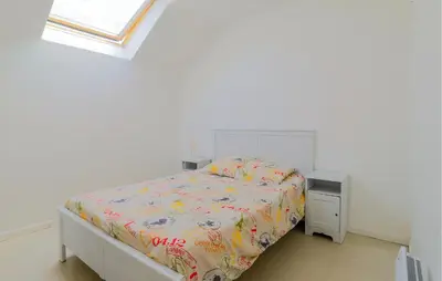 Un ou plusieurs lits dans un hébergement de l'établissement Beautiful Home In Monthenault With Wifi