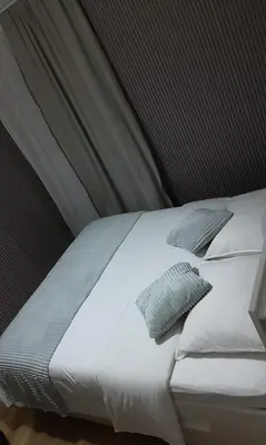 Un ou plusieurs lits dans un hébergement de l'établissement Room Urban Chic