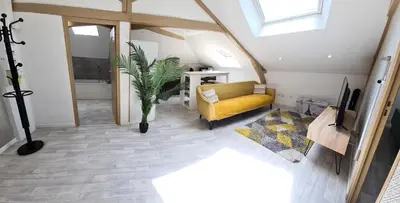 Un ou plusieurs lits dans un hébergement de l'établissement Appartement 2 chambres
