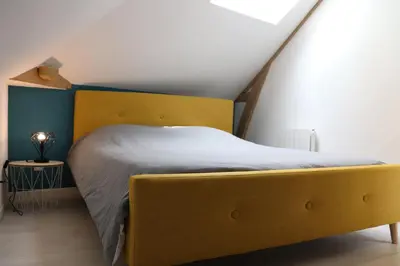 Un ou plusieurs lits dans un hébergement de l'établissement Appartement 2 chambres