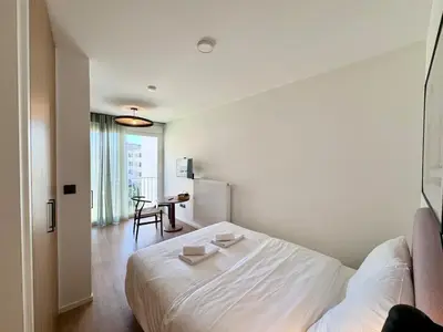 Un ou plusieurs lits dans un hébergement de l'établissement We Live Inn Sharies Reims - C203