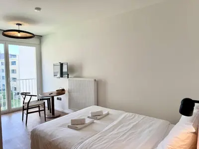 Un ou plusieurs lits dans un hébergement de l'établissement We Live Inn Sharies Reims - C403