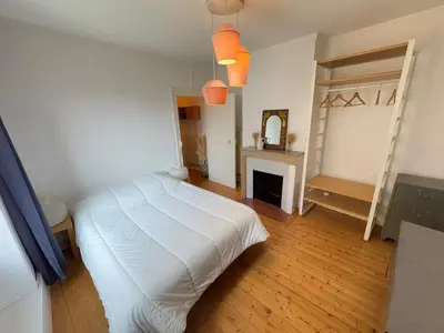 Un ou plusieurs lits dans un hébergement de l'établissement Charming House