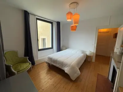 Un ou plusieurs lits dans un hébergement de l'établissement Charming House