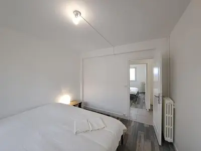 Un ou plusieurs lits dans un hébergement de l'établissement Sofia - grand appartement convivial