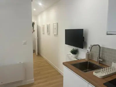 Télévision ou salle de divertissement dans l'établissement Mallorca, plein centre avec parking