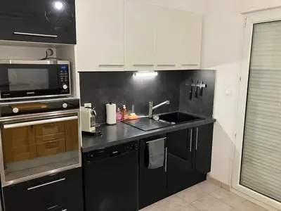 Cuisine ou kitchenette dans l'établissement La pétillante