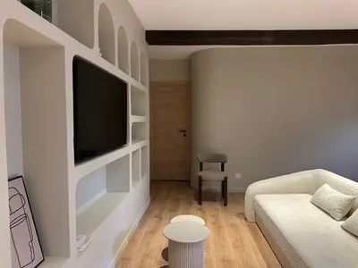 Télévision ou salle de divertissement dans l'établissement Suite Lumière - Cinéma privé by Collection Aura - Hypercentre Charleville-Mézières