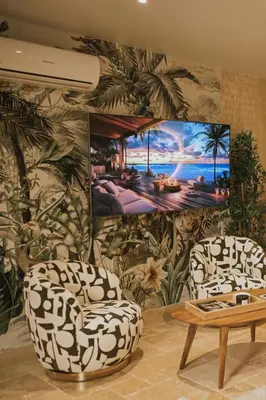 Télévision ou salle de divertissement dans l'établissement Da Mona