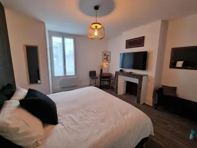 Un ou plusieurs lits dans un hébergement de l'établissement Appartement cosy