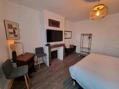 Télévision ou salle de divertissement dans l'établissement Appartement cosy