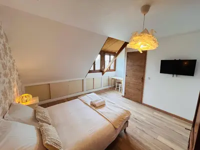 Télévision ou salle de divertissement dans l'établissement La Maison Salzbourg 8 personnes Paisible