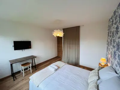 Un ou plusieurs lits dans un hébergement de l'établissement La Maison Salzbourg 8 personnes Paisible