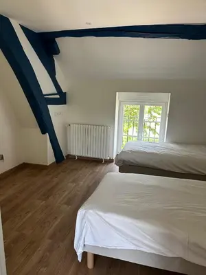 Un ou plusieurs lits dans un hébergement de l'établissement Gîte de Gondelot