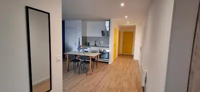 Cuisine ou kitchenette dans l'établissement Hébergement 5 personnes- Centre village