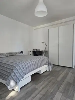Un ou plusieurs lits dans un hébergement de l'établissement appartement Sedan, France