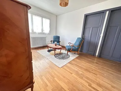 Coin salon dans l'établissement La maison champenoise 4 chambres avec terrasse