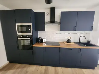 Cuisine ou kitchenette dans l'établissement T3 R&B - Hyper Centre - 2 chambres - 6 personnes avec terrasse