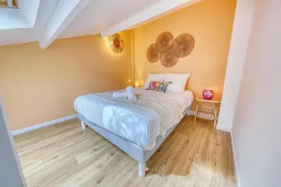 Un ou plusieurs lits dans un hébergement de l'établissement Studio Lenoir - Air conditioning