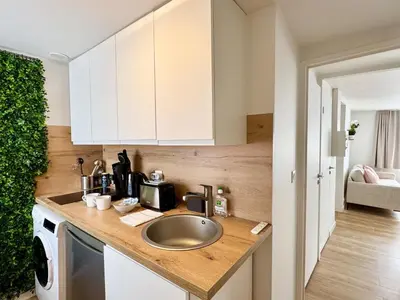 Cuisine ou kitchenette dans l'établissement Rest In Reims - Proche gare & l'Arena