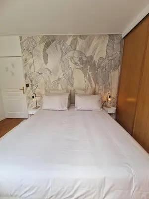 Un ou plusieurs lits dans un hébergement de l'établissement Le Clos Boulingrin - hyper-centre