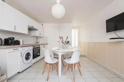 Cuisine ou kitchenette dans l'établissement Le Nid de la Fauvette - Hyper Centre