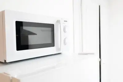 Cuisine ou kitchenette dans l'établissement Appartement Cocoon Chalons Centre