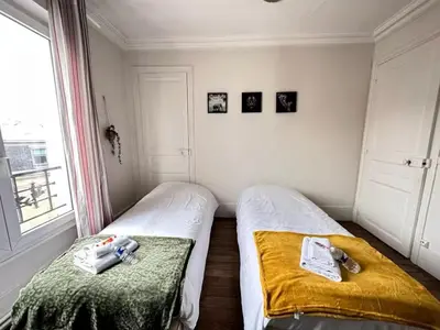 Un ou plusieurs lits dans un hébergement de l'établissement Reims authentique - entre hôtel de ville et forum