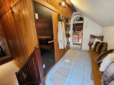 Un ou plusieurs lits dans un hébergement de l'établissement Villa familiale La Finca du champ de l'eau Avec sauna jacuzzi proche de Disney et Paris