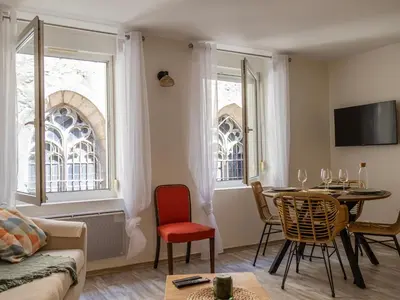 Télévision ou salle de divertissement dans l'établissement Duplex au coeur de Reims - 2 chambres