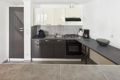 Cuisine ou kitchenette dans l'établissement Le Saint Servais