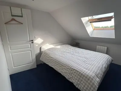 Un ou plusieurs lits dans un hébergement de l'établissement Maison chic et cosy