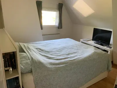 Un ou plusieurs lits dans un hébergement de l'établissement Cozy family home in Champagne-en-Ardenne 8p