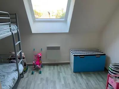 Un ou plusieurs lits dans un hébergement de l'établissement Cozy family home in Champagne-en-Ardenne 8p