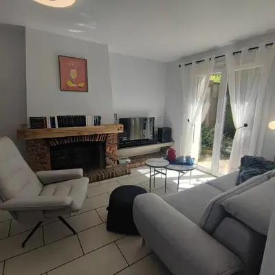 Coin salon dans l'établissement Au Coeur du Verger