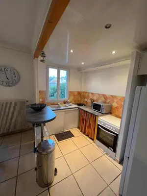Cuisine ou kitchenette dans l'établissement Grand T3 avec parking privé, centre & caves à champagne