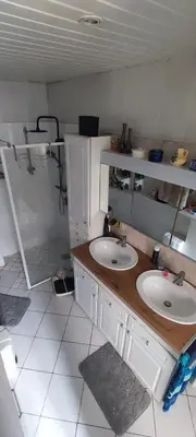 Cuisine ou kitchenette dans l'établissement chambre chez particuier