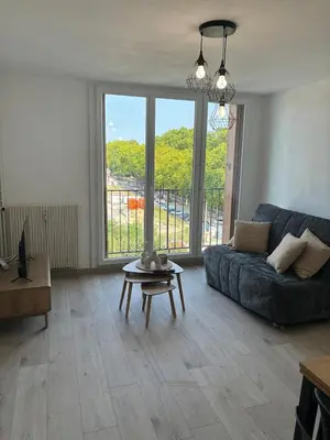 Coin salon dans l'établissement appartement 30m2 spatieux et lumineux